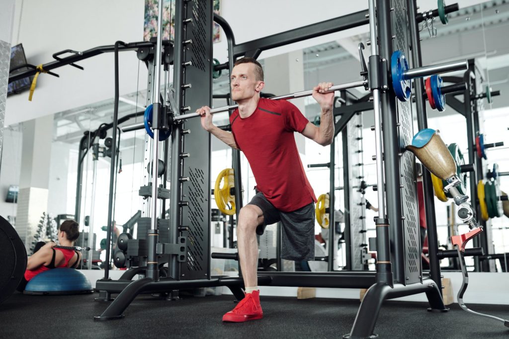 photo of guy lifting weights