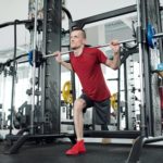 photo of guy lifting weights