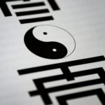 yin and yang printed on paper