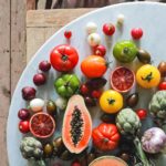 various fresh vegetables and fruits on table