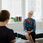 psychologist talking to a patient